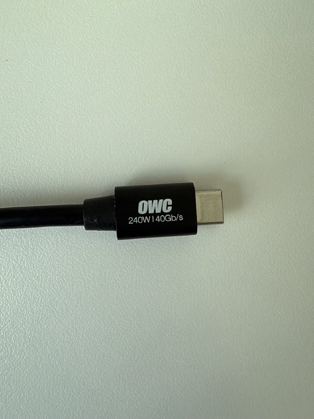 OWC Thunderbolt 4 cable connector, reverse side, printed "OWC 240W | 40Gb/s".